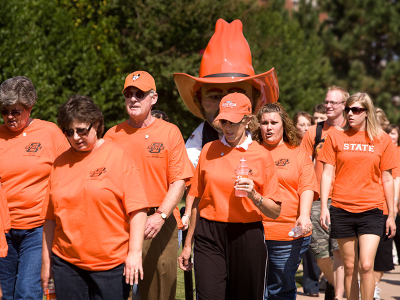 burns and anne participate in wellness walk