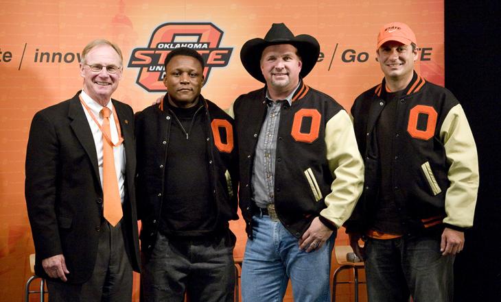 Burns with Barry Sanders, Garth Brooks and Robin Ventura