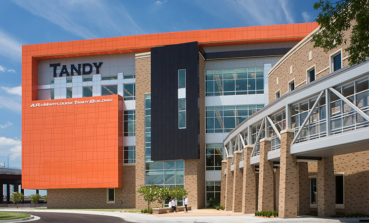 Amy and Malone Mitchell with Burns Hargis