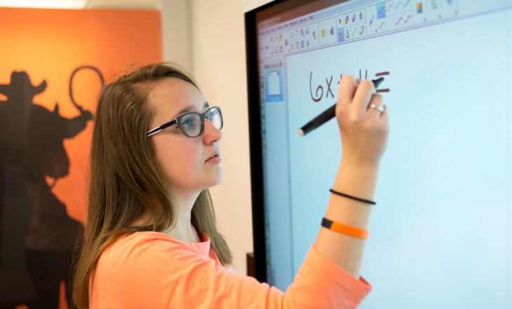 Student at smart board
