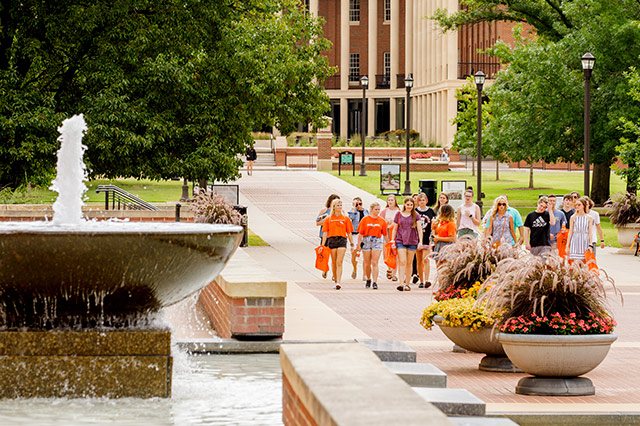 group tour group tour walking on campus