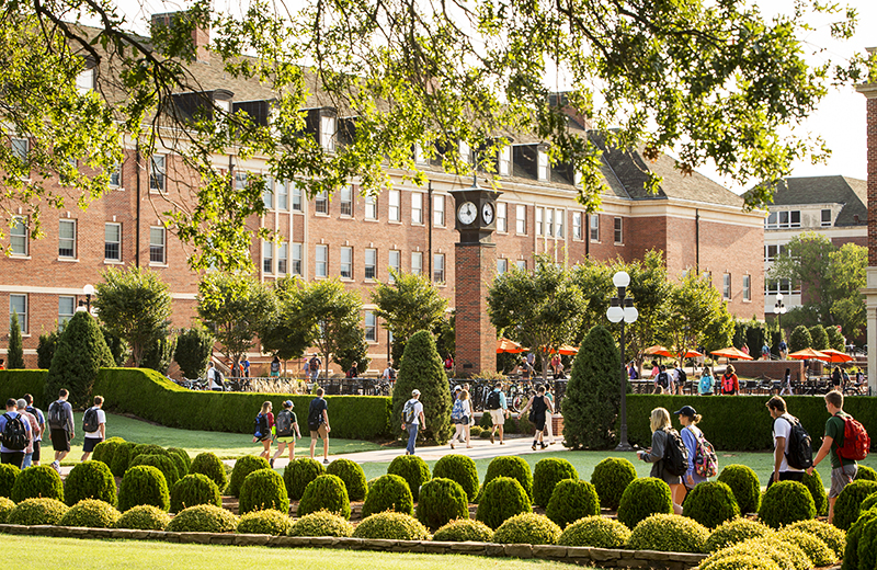 Students traversing OSU's Library lawn