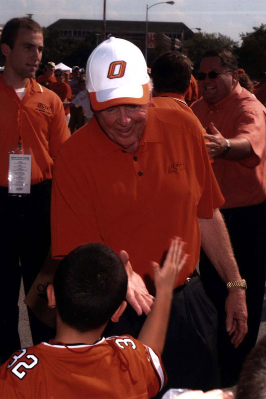 Boone high fives kid