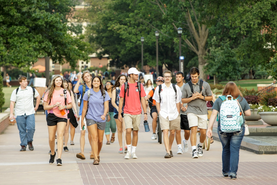 students talking on OSU's campus